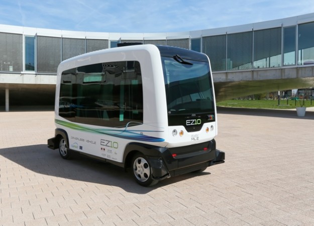 Driverless electric bus takes to public streets in Dutch town, a world ...